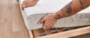 a featured image of how to move a mattress safely